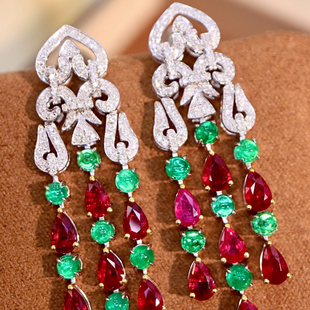 14k Gold 5.27 Ctw Natural Ruby & Diamond Earrings: Ref:230954442 // gold content:14k gold // main gemstone:ruby // shape:pear // carat weight:4. 9ct // color:red // treatment:natural // // adjacent gemstone 2 : diamond // shape:round // carat