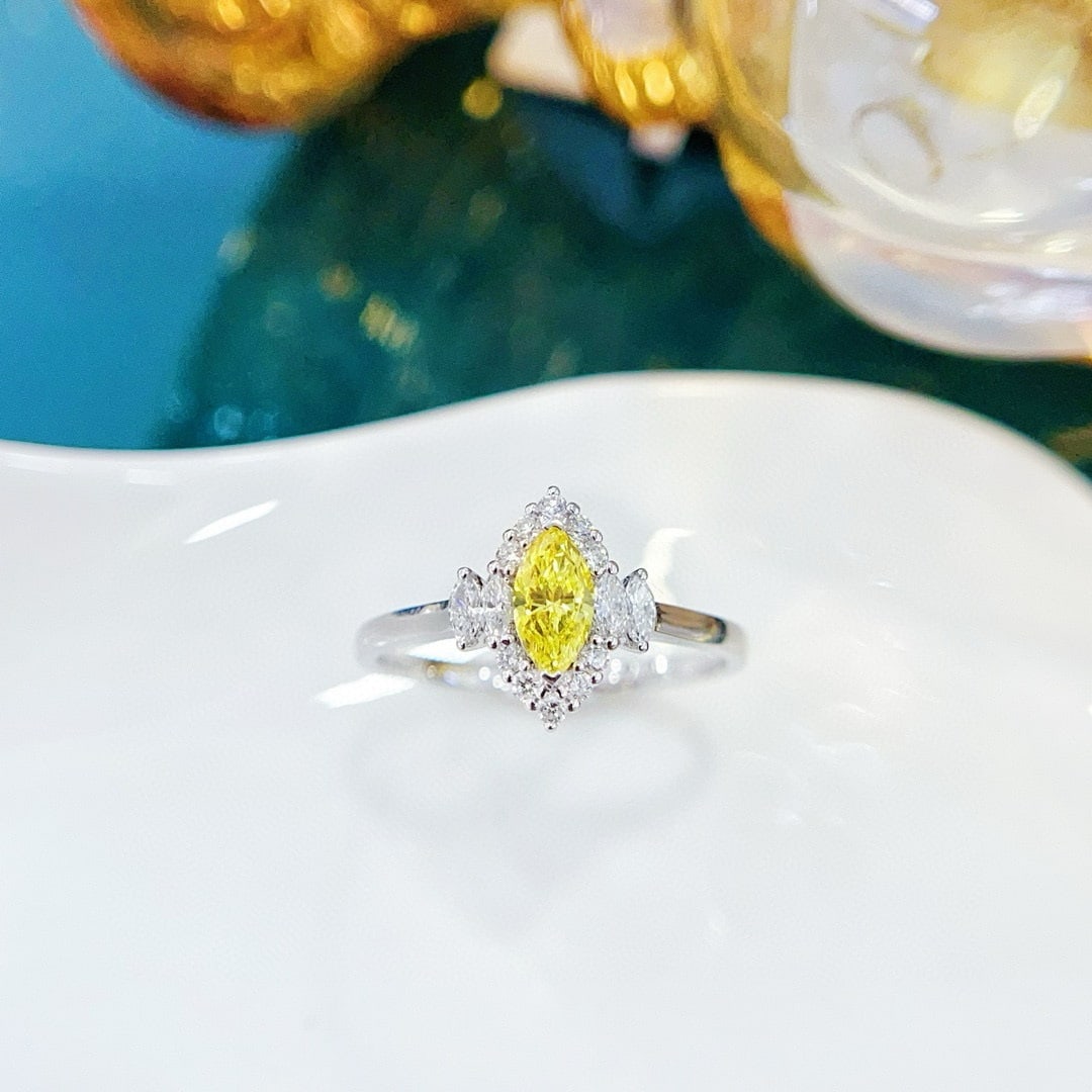 14k Gold 0.59 Ctw Lab Grown Diamond & Diamond Ring: Ref:230957043 // gold content:14k gold // ring size:7. 25us // // main gemstone:lab grown diamond // shape:marquise // carat weight:0. 32ct // color:yellow // // adjacent gemstone 2 : diamond //