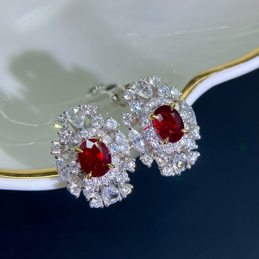 14k Gold 2.30 Ctw Natural Ruby & Diamond Earrings: Ref:230957085 // gold content:14k gold // main gemstone:ruby // shape:oval // carat weight:1. 31ct // color:pigeonblood red // treatment:natural // // adjacent gemstone 2 : diamond //