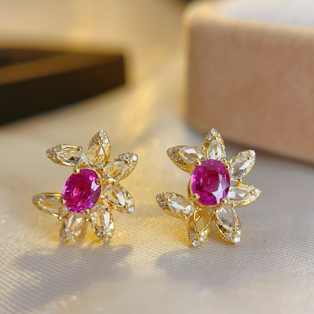 14k Gold 1.00 Ct Natural Ruby & Diamond & Sapphire Earrings: Ref:230957087 // gold content:14k gold // main gemstone:ruby // shape:oval // carat weight:1. 00ct // color:red // treatment:natural // // adjacent gemstone 2 : diamond // number of stones:42 //