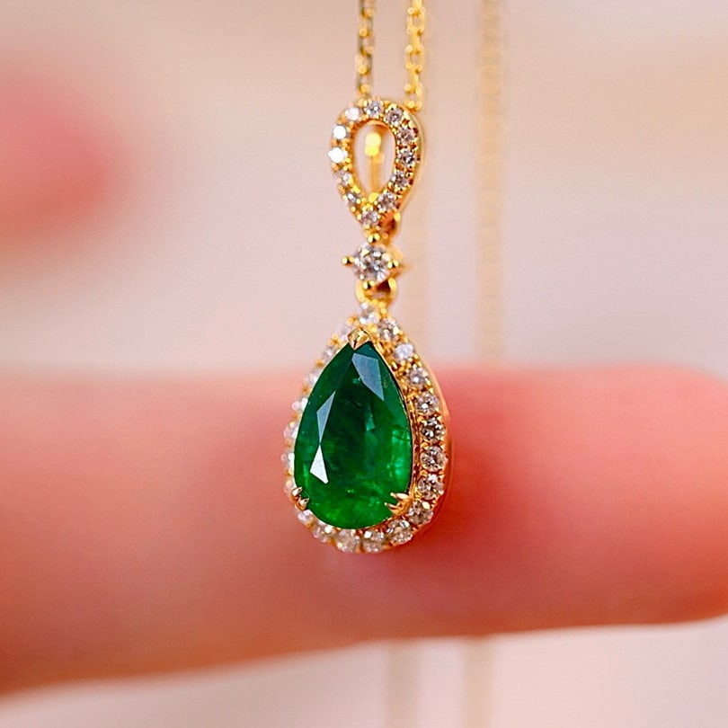 14k Gold 1.91 Ctw Vivid Green Natural Emerald & Diamond Pendant( Without Chain ): Ref:230957095 // gold content:14k gold // main gemstone:emerald // shape:pear // carat weight:1. 60ct // color:vivid green // treatment:natural // // adjacent gemstone 2 : diamond // shape:round //