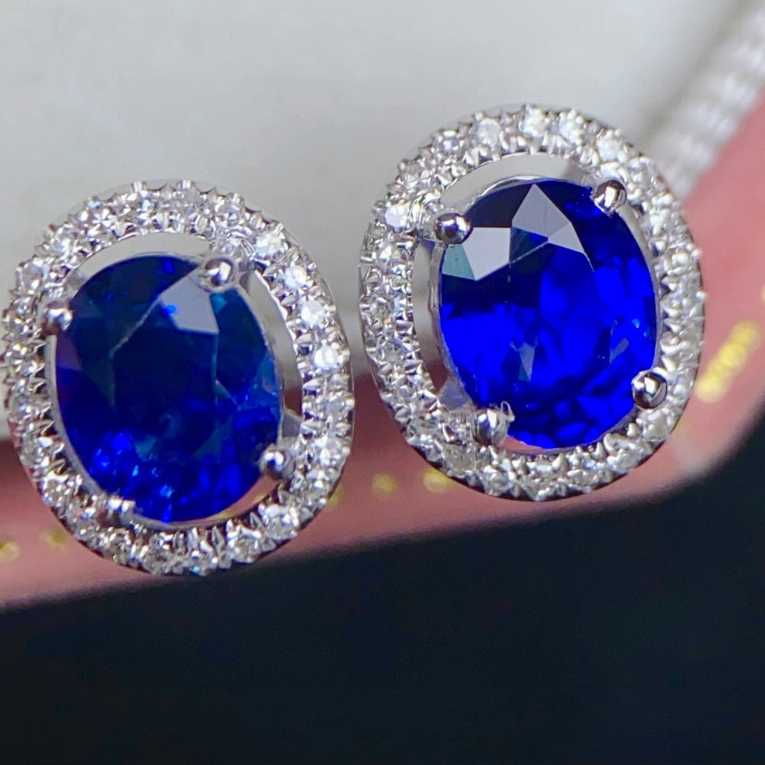 14k Gold 1.49 Ctw Vivid Blue Natural Sapphire & Diamond Earrings: Ref:230957113 // gold content:14k gold // main gemstone:sapphire // shape:oval // carat weight:1. 35ct // color:vivid blue // treatment:natural // // adjacent gemstone 2 : diamond // number of