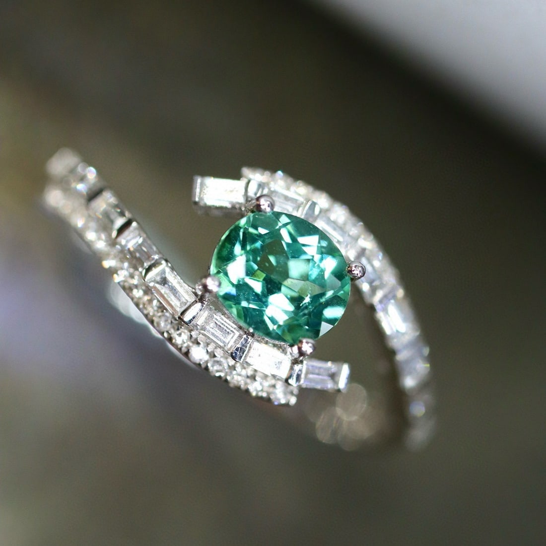 14k Gold 0.90 Ctw Natural Paraiba Tourmaline & Diamond Ring: Ref:230957117 // gold content:14k gold // ring size:7. 25us // // main gemstone:paraiba tourmaline // shape:oval // carat weight:0. 53ct // color:green // treatment:natural // // adjacent gemstone