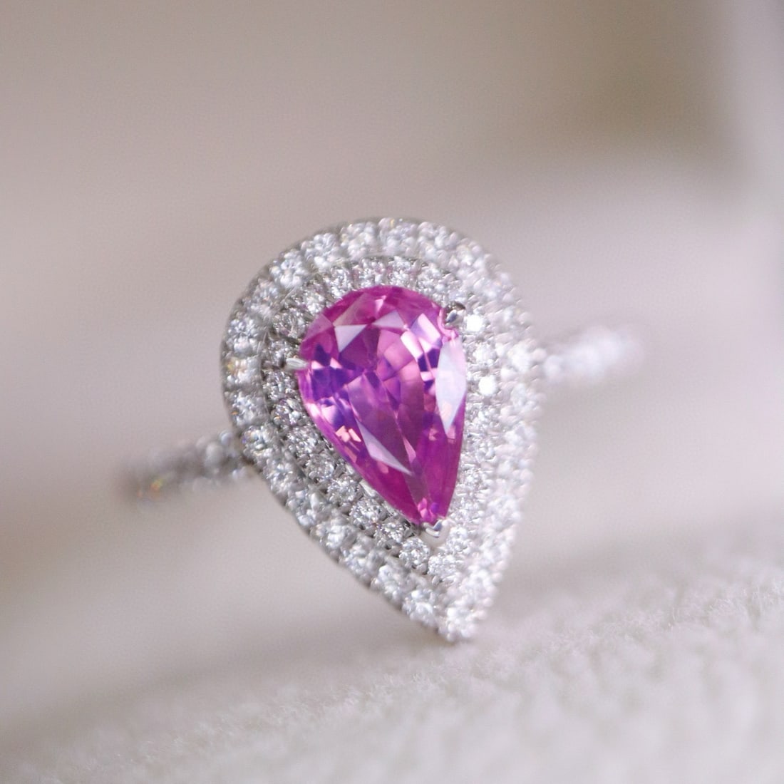 14k Gold 1.20 Ctw Natural Padparadscha Sapphire & Diamond Ring: Ref:230957151 // gold content:14k gold // ring size:7. 25us // // main gemstone:padparadscha sapphire // shape:pear // carat weight:0. 86ct // color:orangish pink // treatment:natural // //