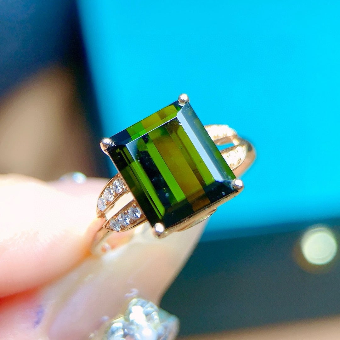 14k Gold 4.49 Ctw Natural Tourmaline & Diamond Ring: Ref:230957173 // gold content:14k gold // ring size:7. 25us // // main gemstone:tourmaline // shape:octagonal // carat weight:4. 4ct // color:green // treatment:natural // // adjacent gemstone 2 :