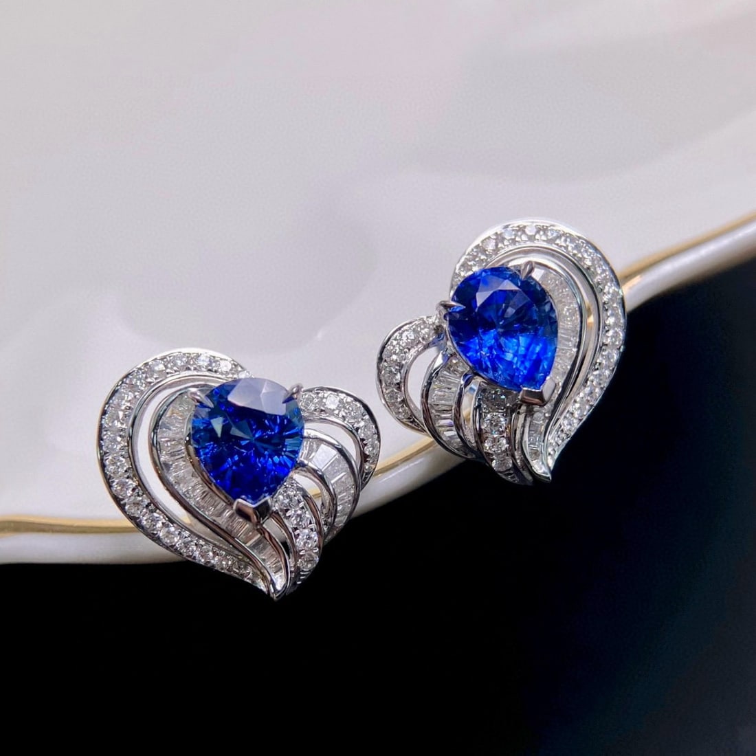 14k Gold 2.70 Ctw Natural Sapphire & Diamond Earrings: Ref:230957176 // gold content:14k gold // main gemstone:sapphire // shape:pear // carat weight:2. 26ct // color:royal blue // treatment:natural // // adjacent gemstone 2 : diamond // shape:multiply