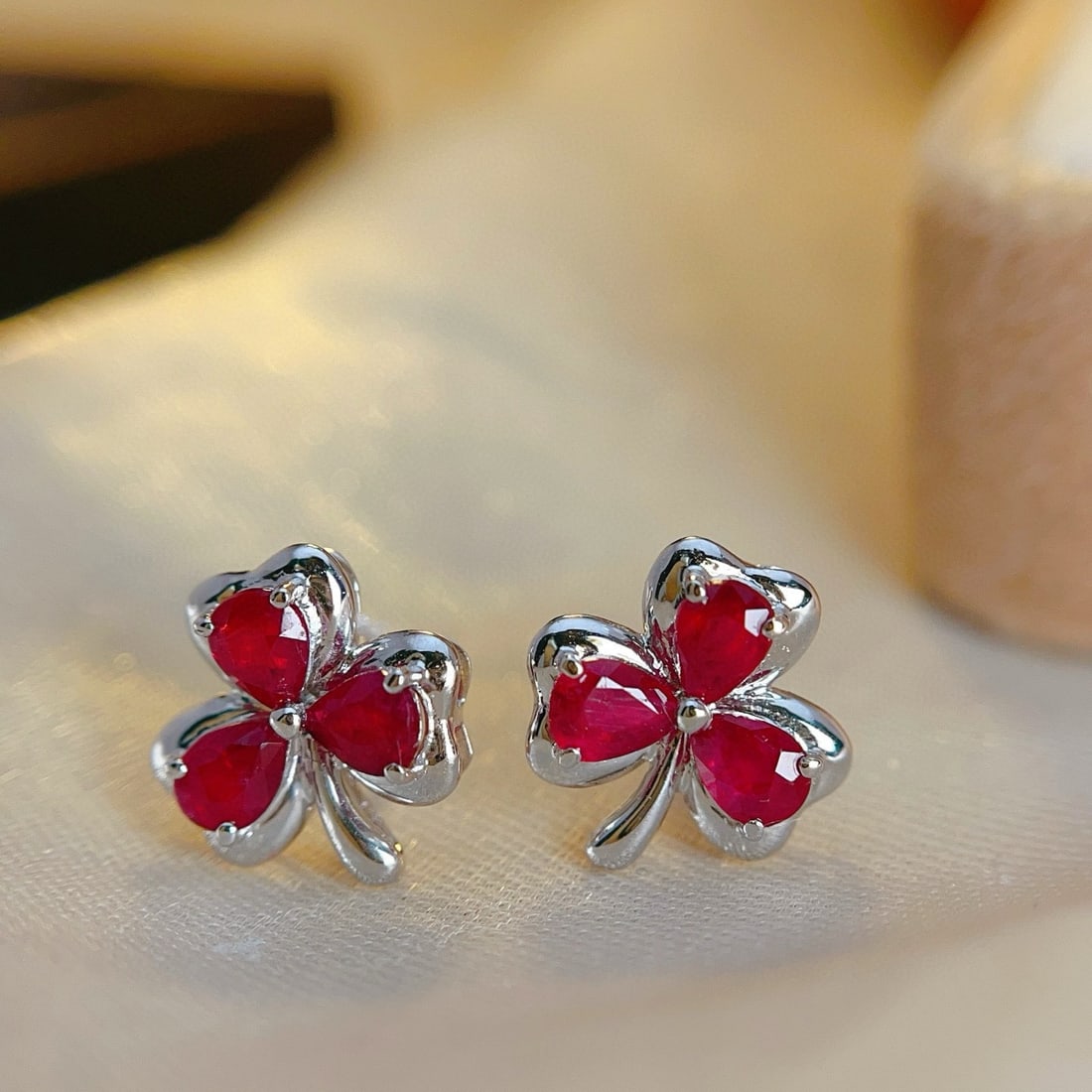 14k Gold 1.45 Ct Vivid Red Natural Ruby Earrings: Ref:230957186 // gold content:14k gold // main gemstone:ruby // shape:pear // carat weight:1. 45ct // color:vivid red // treatment:natural // Condition: NewLow Estimate: 2200.00High Estimate: 3300.00