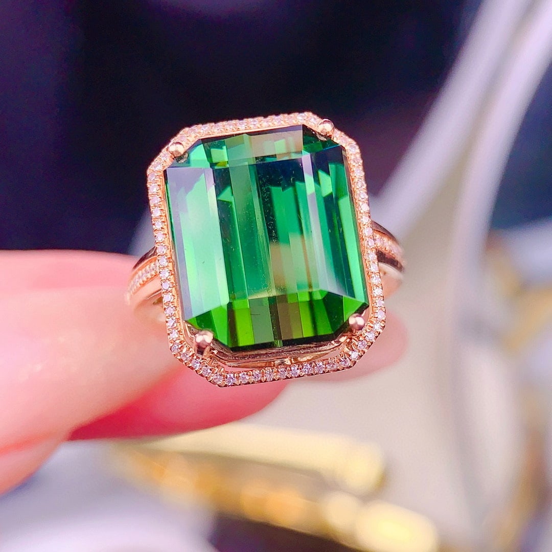 14k Gold 11 Ct Natural Tourmaline & Diamond Ring: Ref:230957191 // gold content:14k gold // ring size:7. 25us // // main gemstone:tourmaline // shape:octagonal // carat weight:11ct // color:green // treatment:natural // // adjacent gemstone 2 : diamo