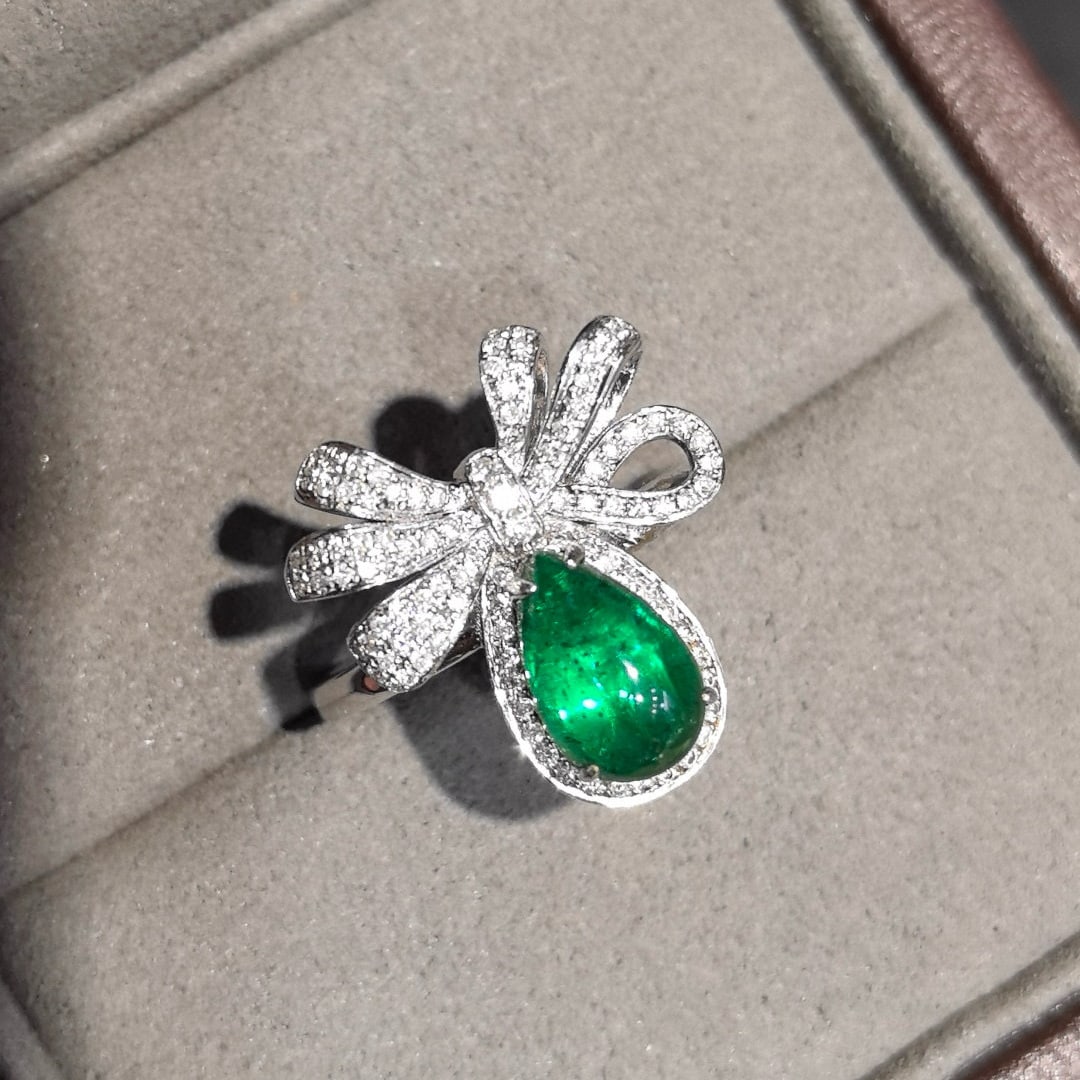 14k Gold 2.14 Ctw Vivid Green Natural Emerald & Diamond Ring: Ref:230958062 // gold content:14k gold // ring size:7. 25us // // main gemstone:emerald // shape:pear // carat weight:1. 78ct // color:vivid green // treatment:natural // // adjacent gemstone 2 :