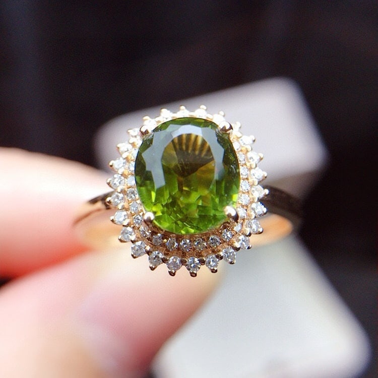 14k Gold 2.21 Ctw Natural Tourmaline & Diamond Ring: Ref:230958077 // gold content:14k gold // ring size:7. 25us // // main gemstone:tourmaline // shape:oval // carat weight:2ct // color:green // treatment:natural // // adjacent gemstone 2 : diamond