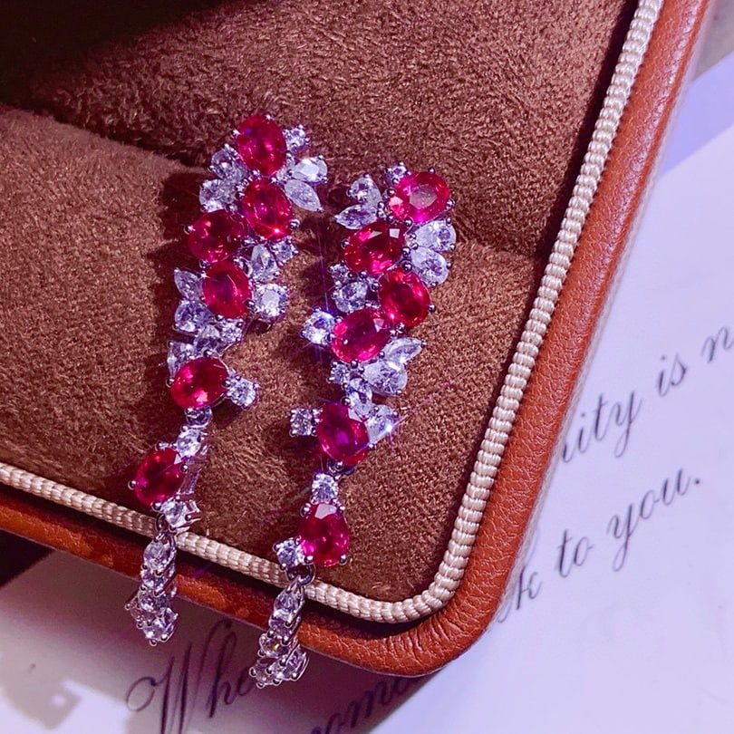 14k Gold 4.31 Ctw Natural Ruby & Sapphire Earrings: Ref:230958080 // gold content:14k gold // main gemstone:ruby // shape:oval // carat weight:2. 75ct // color:red // treatment:natural // // adjacent gemstone 2 : sapphire // shape:multiply // carat