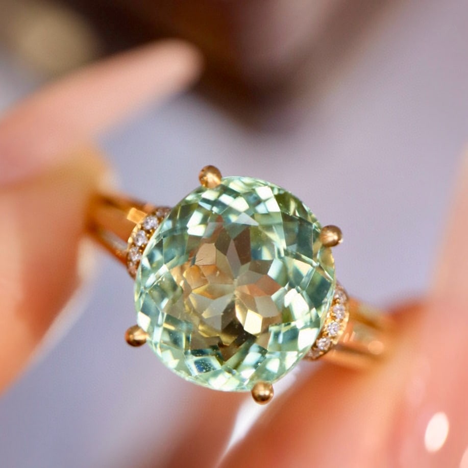 14k Gold 4.45 Ctw Natural Tourmaline & Diamond Ring: Ref:230958117 // gold content:14k gold // ring size:7. 25us // // main gemstone:tourmaline // shape:oval // carat weight:4. 41ct // color:green // treatment:natural // // adjacent gemstone 2 :