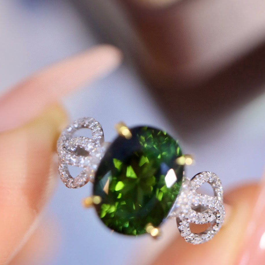 14k Gold 2.83 Ctw Natural Tourmaline & Diamond Ring: Ref:230958118 // gold content:14k gold // ring size:7. 25us // // main gemstone:tourmaline // shape:oval // carat weight:2. 65ct // color:green // treatment:natural // // adjacent gemstone 2 :