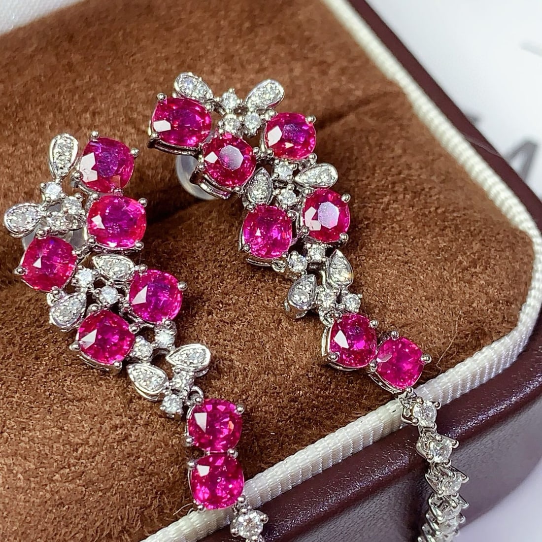 14k Gold 4.49 Ctw Natural Ruby & Diamond Earrings: Ref:230958202 // gold content:14k gold // main gemstone:ruby // shape:cushion // carat weight:3. 82ct // color:red // treatment:natural // // adjacent gemstone 2 : diamond // shape:round // carat