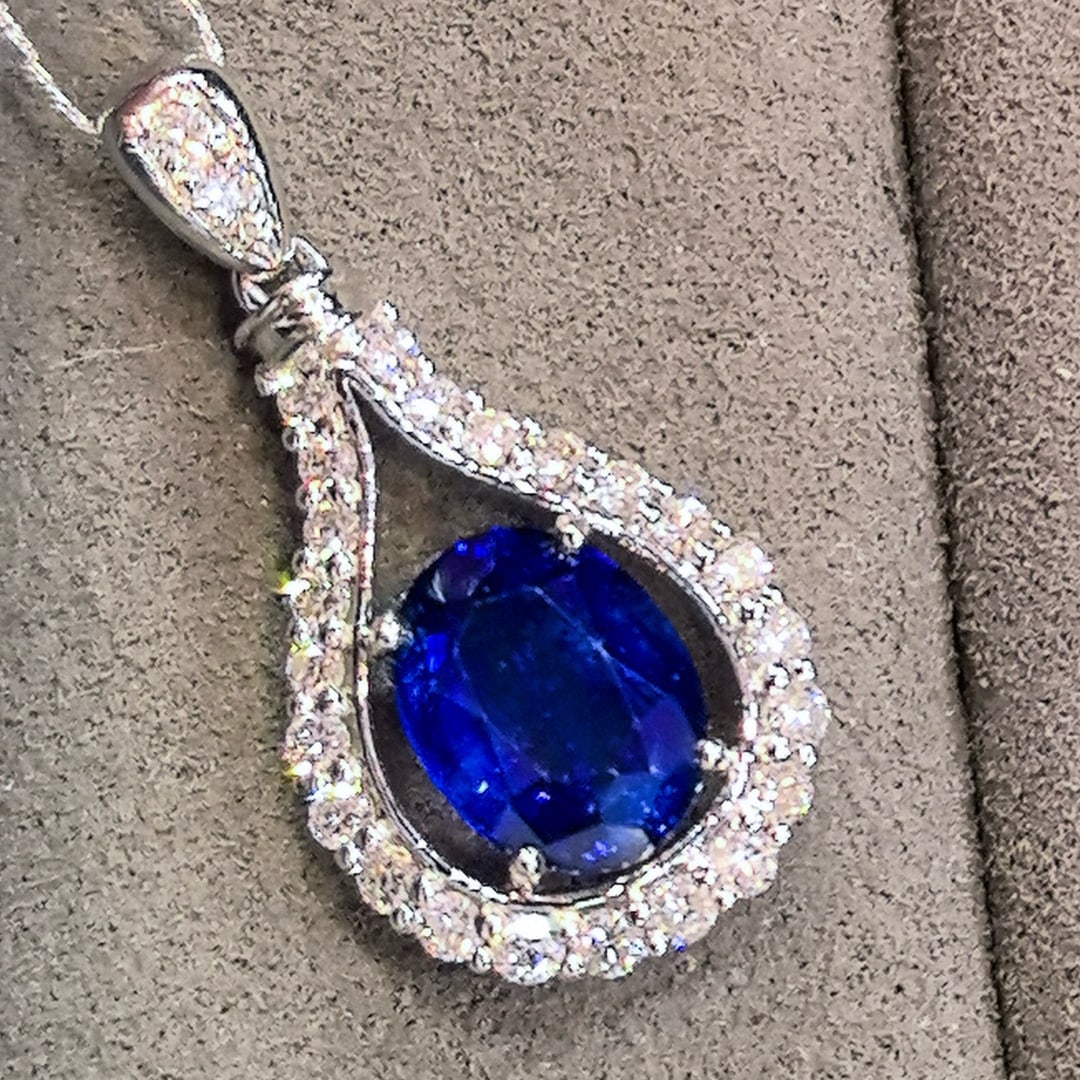 14k Gold 2.31 Ctw Natural Sapphire & Diamond Pendant( Without Chain ): Ref:230958359 // gold content:14k gold // main gemstone:sapphire // shape:oval // carat weight:1. 86ct // color:royal blue // treatment:natural // // adjacent gemstone 2 : diamond // shape:round //