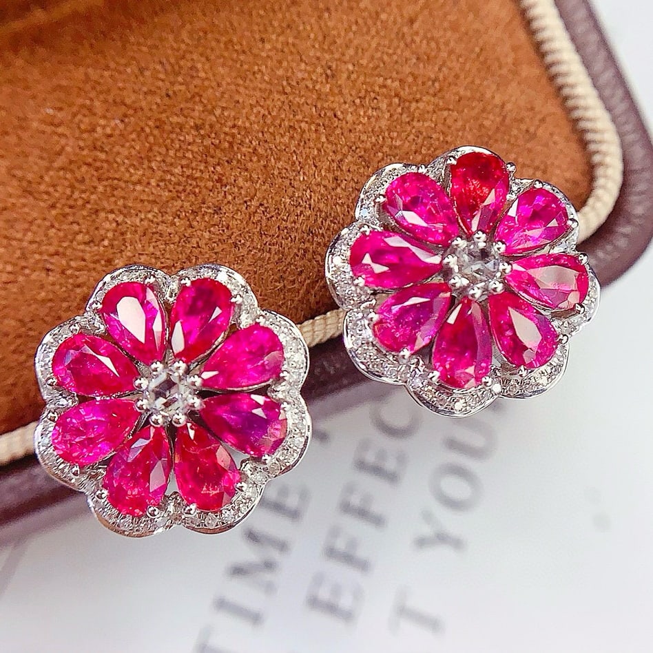 14k Gold 6 Ct Natural Ruby & Diamond Earrings: Ref:230958394 // gold content:14k gold // main gemstone:ruby // shape:pear // carat weight:6ct // color:red // treatment:natural // // adjacent gemstone 2 : diamond // number of stones:100 // shape:ro