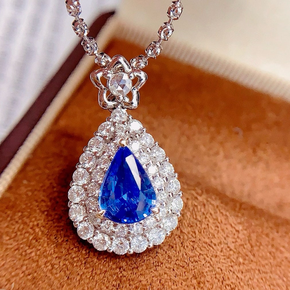 14k Gold 1.35 Ct Natural Sapphire & Diamond Pendant( Without Chain ): Ref:230958409 // gold content:14k gold // main gemstone:sapphire // shape:pear // carat weight:1. 35ct // color:blue // treatment:natural // // adjacent gemstone 2 : diamond // number of stones:38 //