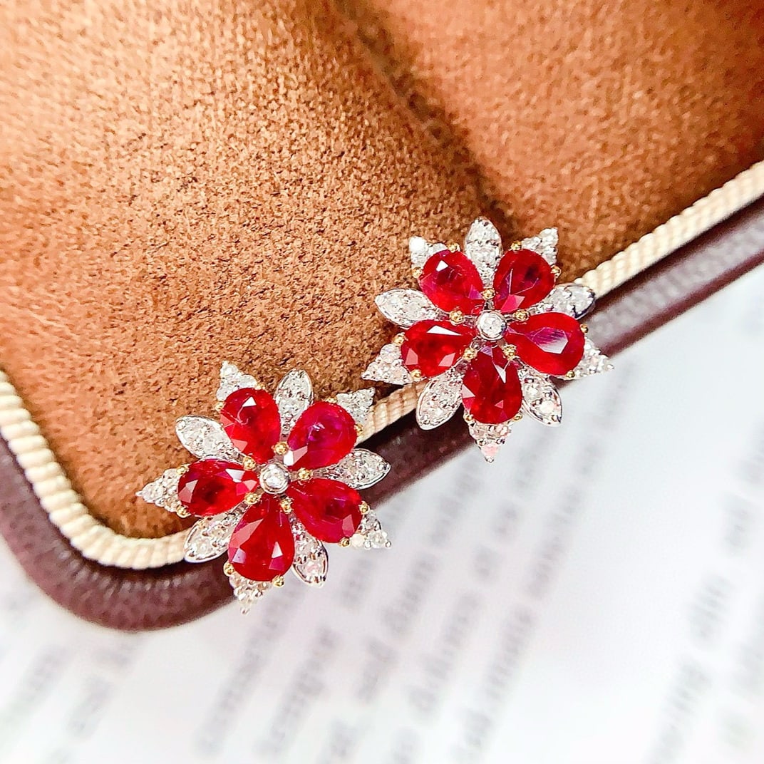 14k Gold 2 Ct Vivid Red Natural Ruby & Diamond Earrings: Ref:230958411 // gold content:14k gold // main gemstone:ruby // shape:pear // carat weight:2ct // color:vivid red // treatment:natural // // adjacent gemstone 2 : diamond // number of stones:52 //