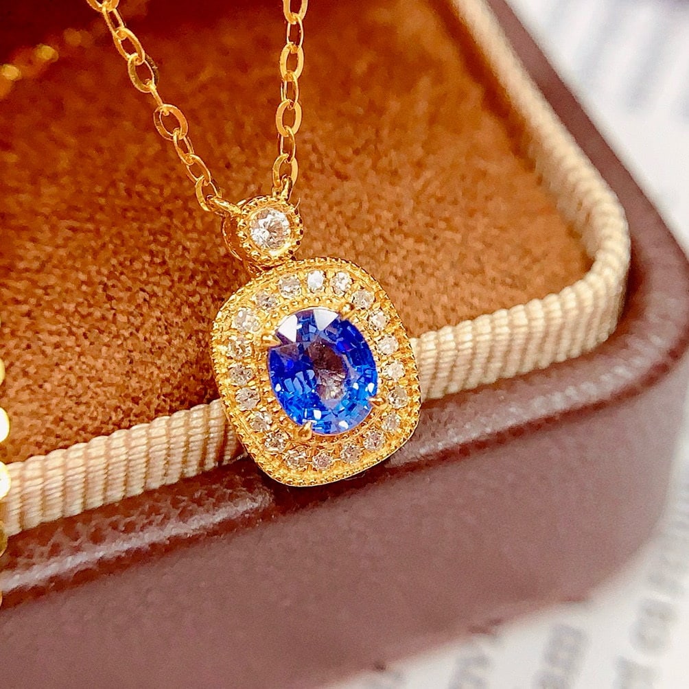 14k Gold 0.65 Ct Natural Sapphire & Diamond Necklace: Ref:230958412 // gold content:14k gold // main gemstone:sapphire // shape:oval // carat weight:0. 65ct // color:blue // treatment:natural // // adjacent gemstone 2 : diamond // number of stones:21
