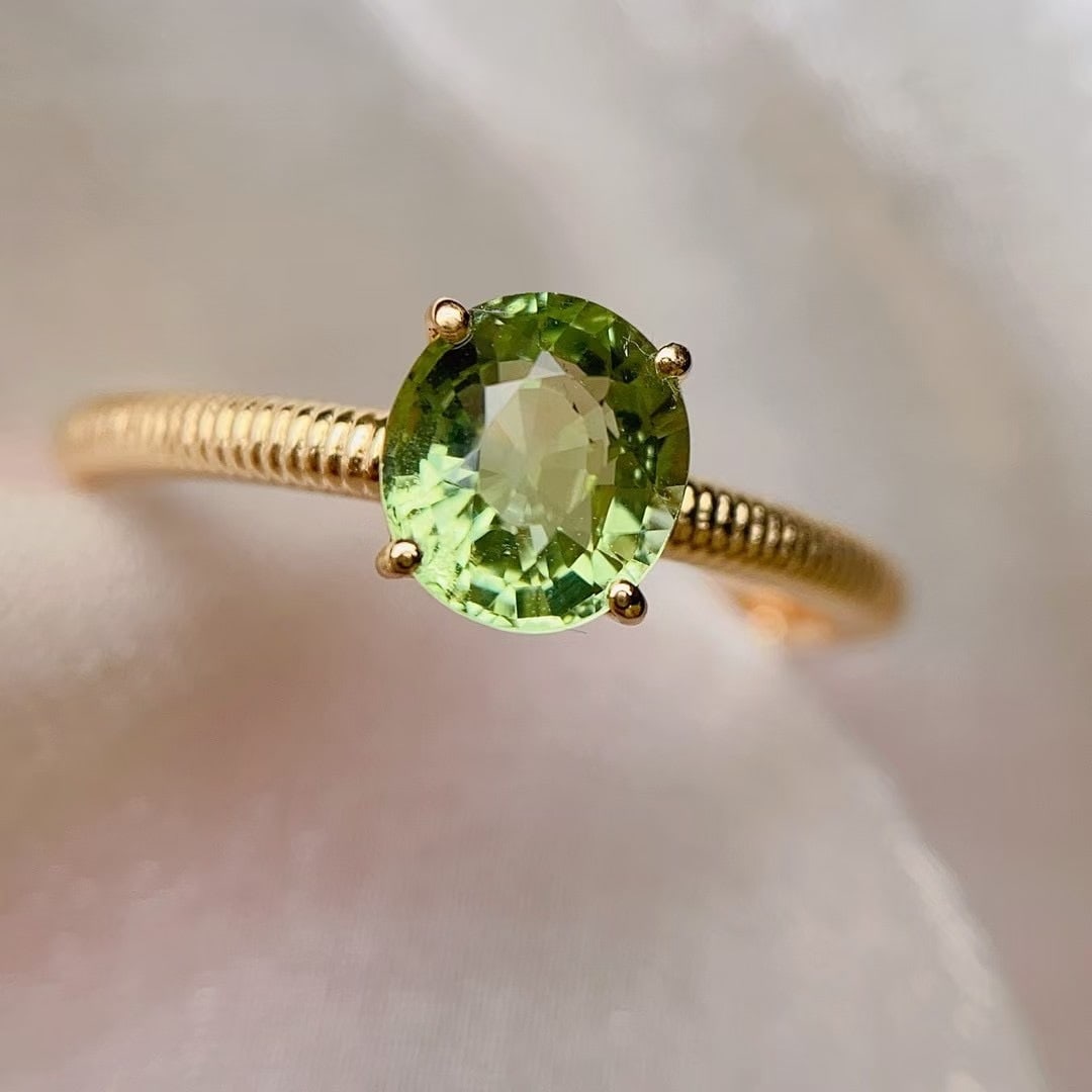 14k Gold 1.15 Ct Natural Tourmaline Ring: Ref:230964104 // gold content:14k gold // ring size:7. 25us // // main gemstone:tourmaline // shape:oval // carat weight:1. 15ct // color:green // treatment:natural // Condition: New Low Estimate: