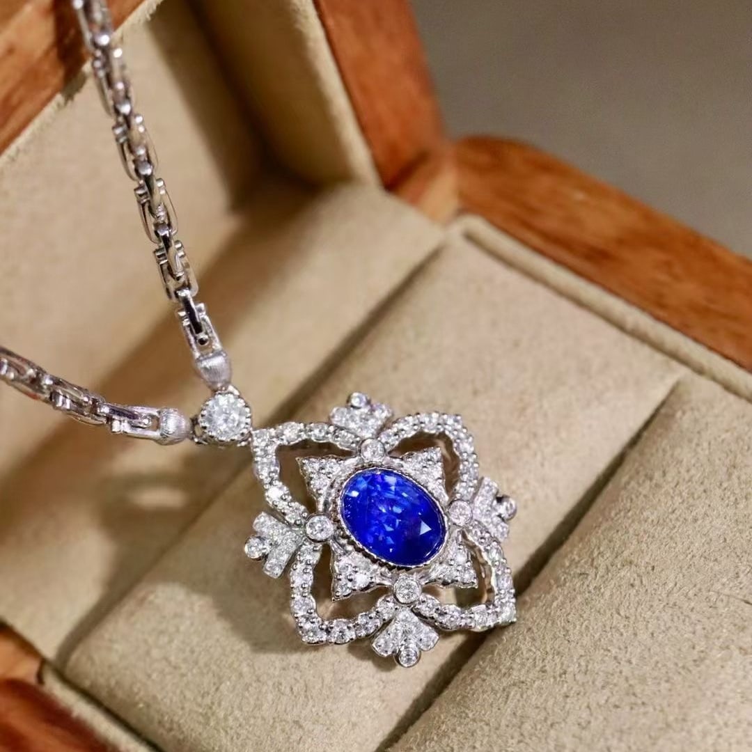 14k Gold 1.71 Ctw Natural Sapphire & Diamond Necklace: Ref:230964190 // gold content:14k gold // main gemstone:sapphire // shape:oval // carat weight:1. 23ct // color:blue // treatment:natural // // adjacent gemstone 2 : diamond // shape:round // carat
