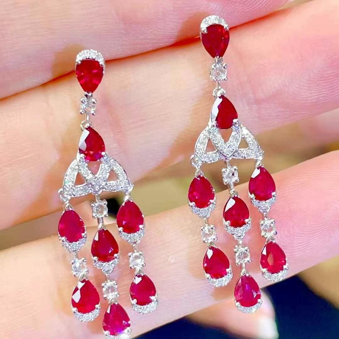 14k Gold 3.6 Ct Natural Ruby & Diamond Earrings: Ref:230964341 // gold content:14k gold // main gemstone:ruby // shape:pear // carat weight:3. 6ct // color:pigeonblood red // treatment:natural // // adjacent gemstone 2 : diamond // shape:round //