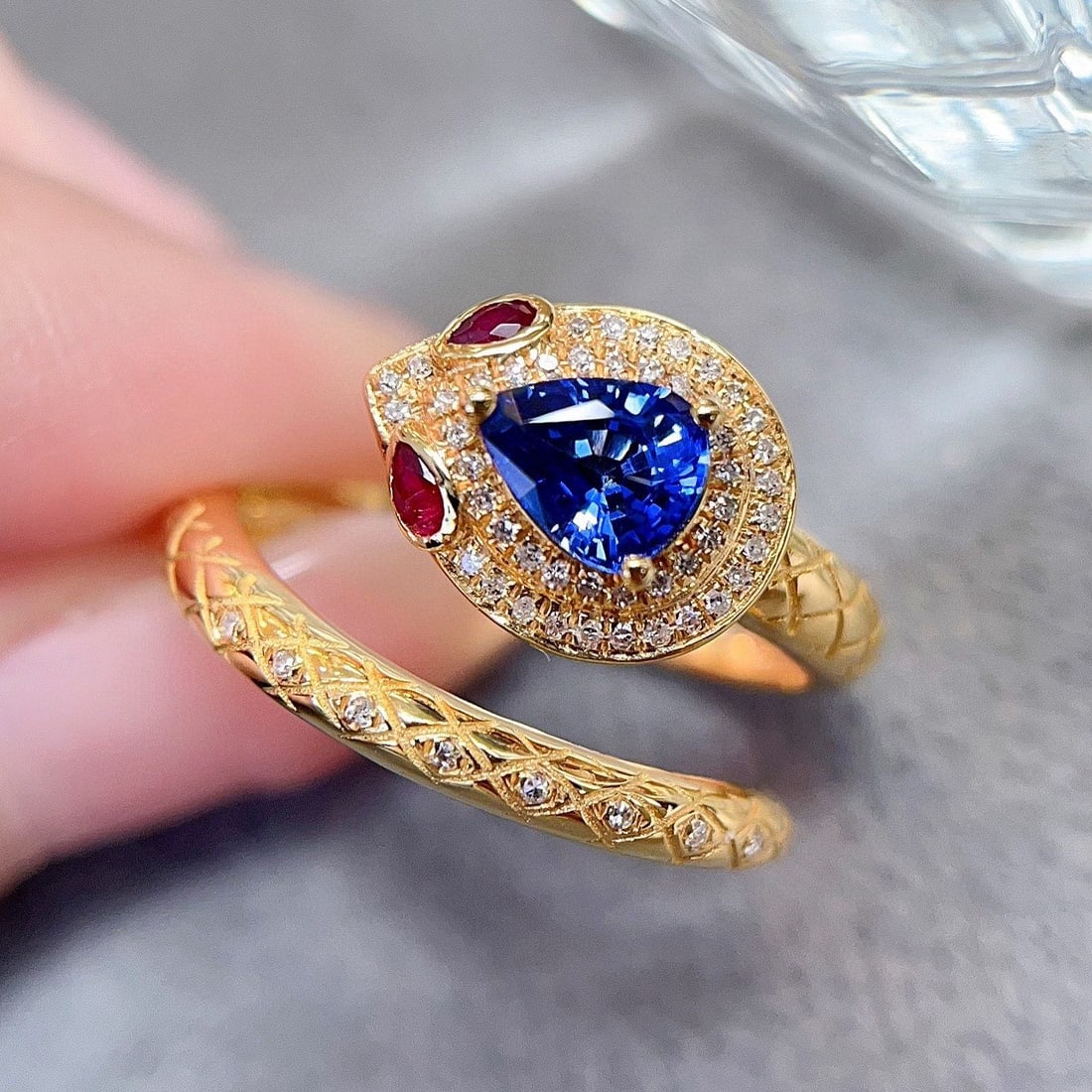 14k Gold 0.85 Ct Natural Sapphire & Diamond & Ruby Ring: Ref:230964439 // gold content:14k gold // ring size:7. 25us // // main gemstone:sapphire // shape:pear // carat weight:0. 85ct // color:cornflower blue // treatment:natural // // adjacent gemstone 2