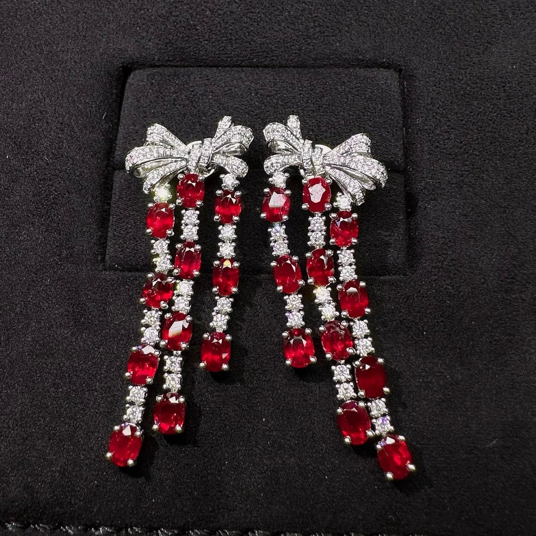 14k Gold 7.09 Ctw Natural Ruby & Diamond Earrings: Ref:230965034 // gold content:14k gold // main gemstone:ruby // shape:oval // carat weight:6. 2ct // color:pigeonblood red // treatment:natural // // adjacent gemstone 2 : diamond // shape:round // ca
