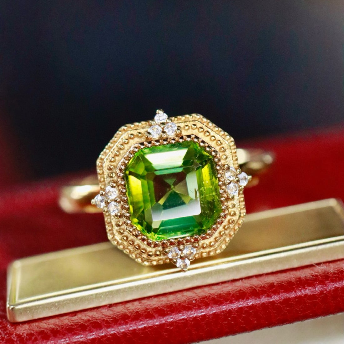14k Gold 1.62 Ctw Natural Tourmaline & Sapphire Ring: Ref:230965121 // gold content:14k gold // ring size:7. 25us // // main gemstone:tourmaline // shape:octagonal // carat weight:1. 55ct // color:green // treatment:natural // // adjacent gemstone 2 :