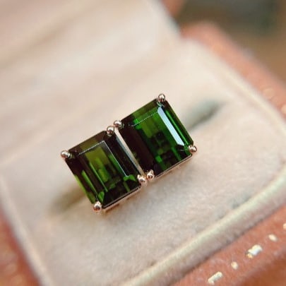 14k Gold 2.17 Ct Natural Tourmaline Earrings: Ref:230965220 // gold content:14k gold // main gemstone:tourmaline // shape:octagonal // carat weight:2. 17ct // color:green // treatment:natural // Condition: New Low Estimate: 1300.00 High