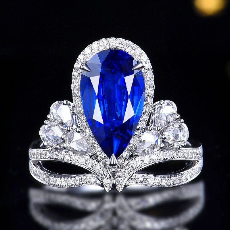 14k Gold 3.00 Ctw Vivid Blue Natural Sapphire & Diamond Ring: Ref:230966047 // gold content:14k gold // ring size:7. 25us // // main gemstone:sapphire // shape:pear // carat weight:2. 41ct // color:vivid blue // treatment:natural // // adjacent gemstone 2 :