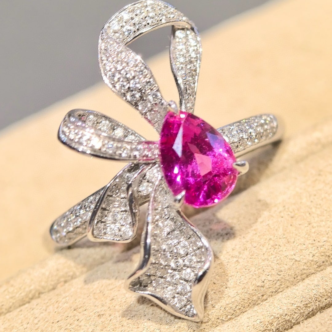 14k Gold 1.62 Ctw Natural Sapphire & Diamond Ring: Ref:230966082 // gold content:14k gold // ring size:7. 25us // // main gemstone:sapphire // shape:pear // carat weight:1. 21ct // color:pink // treatment:natural // // adjacent gemstone 2 : diamond