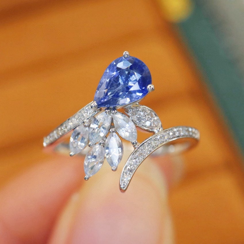 14k Gold 1.02 Ctw Natural Sapphire & Diamond Ring: Ref:230966118 // gold content:14k gold // ring size:7. 25us // // main gemstone:sapphire // shape:pear // carat weight:0. 93ct // color:cornflower blue // treatment:natural // // adjacent gemstone 2