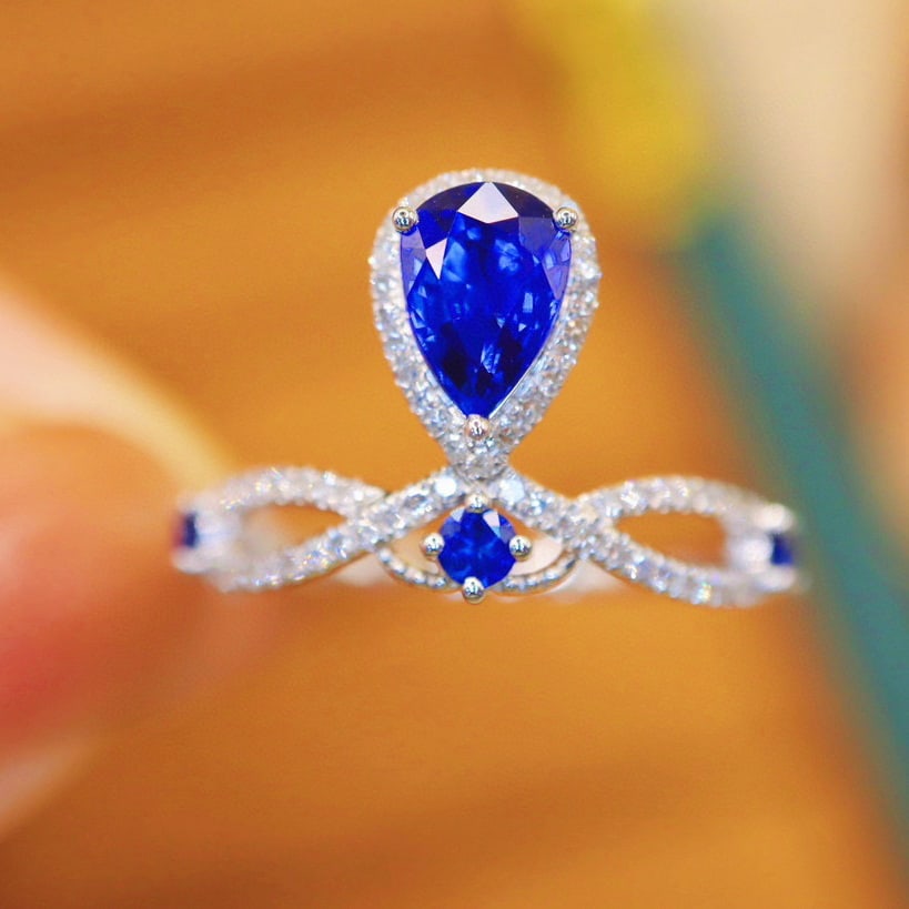 14k Gold 1.09 Ctw Natural Sapphire & Diamond Ring: Ref:230966121 // gold content:14k gold // ring size:7. 25us // // main gemstone:sapphire // shape:pear // carat weight:0. 9ct // color:royal blue // treatment:natural // // adjacent gemstone 2 :