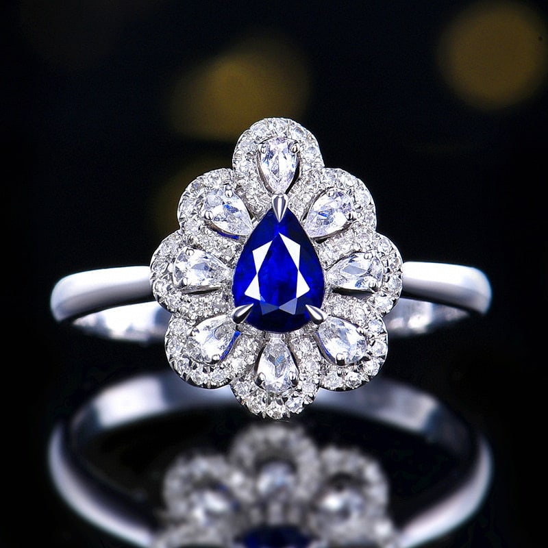 14k Gold 0.55 Ct Natural Sapphire & Diamond & Sapphire Ring: Ref:230966243 // gold content:14k gold // ring size:7. 25us // // main gemstone:sapphire // shape:pear // carat weight:0. 55ct // color:royal blue // treatment:natural // // adjacent gemstone 2 :