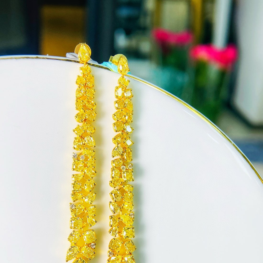 14k Gold 6.72 Ct Natural Yellow Diamond Earrings: Ref:230966319 // gold content:14k gold // main gemstone:yellow diamond // shape:multiply // carat weight:6. 72ct // color:yellow // treatment:natural // Condition: New Low Estimate: 25000.00 High Esti