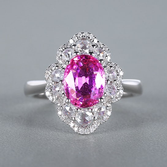 14k Gold 2.51 Ctw Natural Padparadscha Sapphire & Diamond Ring: Ref:230978246 // gold content:14k gold // ring size:7. 25us // // main gemstone:padparadscha sapphire // shape:oval // carat weight:2. 09ct // color:orangish pink // treatment:natural // // adjacent