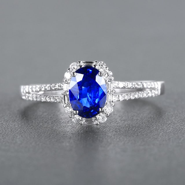 14k Gold 1.16 Ctw Natural Sapphire & Diamond Ring: Ref:230978284 // gold content:14k gold // ring size:7. 25us // // main gemstone:sapphire // shape:oval // carat weight:0. 9ct // color:royal blue // treatment:natural // // adjacent gemstone 2 :