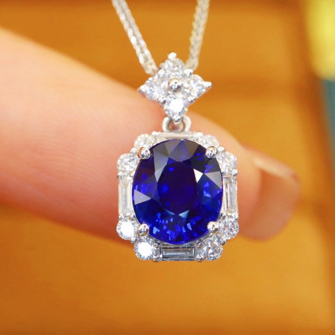 14k Gold 2.42 Ctw Natural Sapphire & Diamond Pendant( Without Chain ): Ref:230978391 // gold content:14k gold // main gemstone:sapphire // shape:oval // carat weight:2. 05ct // color:royal blue // treatment:natural // // adjacent gemstone 2 : diamond // number of stones: