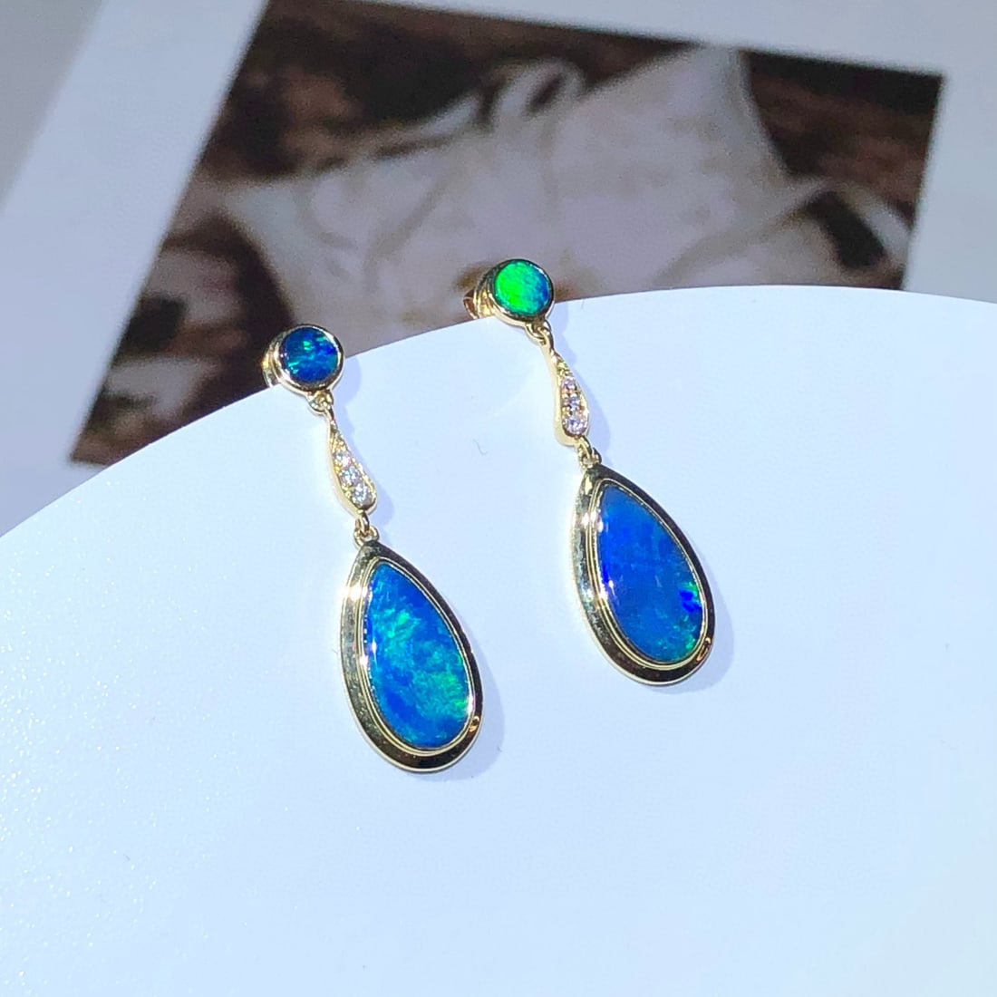 14k Gold 1.38 Ctw Natural Opal & Diamond Earrings: Ref:230983025 // gold content:14k gold // main gemstone:opal // shape:multiply // carat weight:1. 37ct // color:color // treatment:natural // // adjacent gemstone 2 : diamond // shape:round // carat w