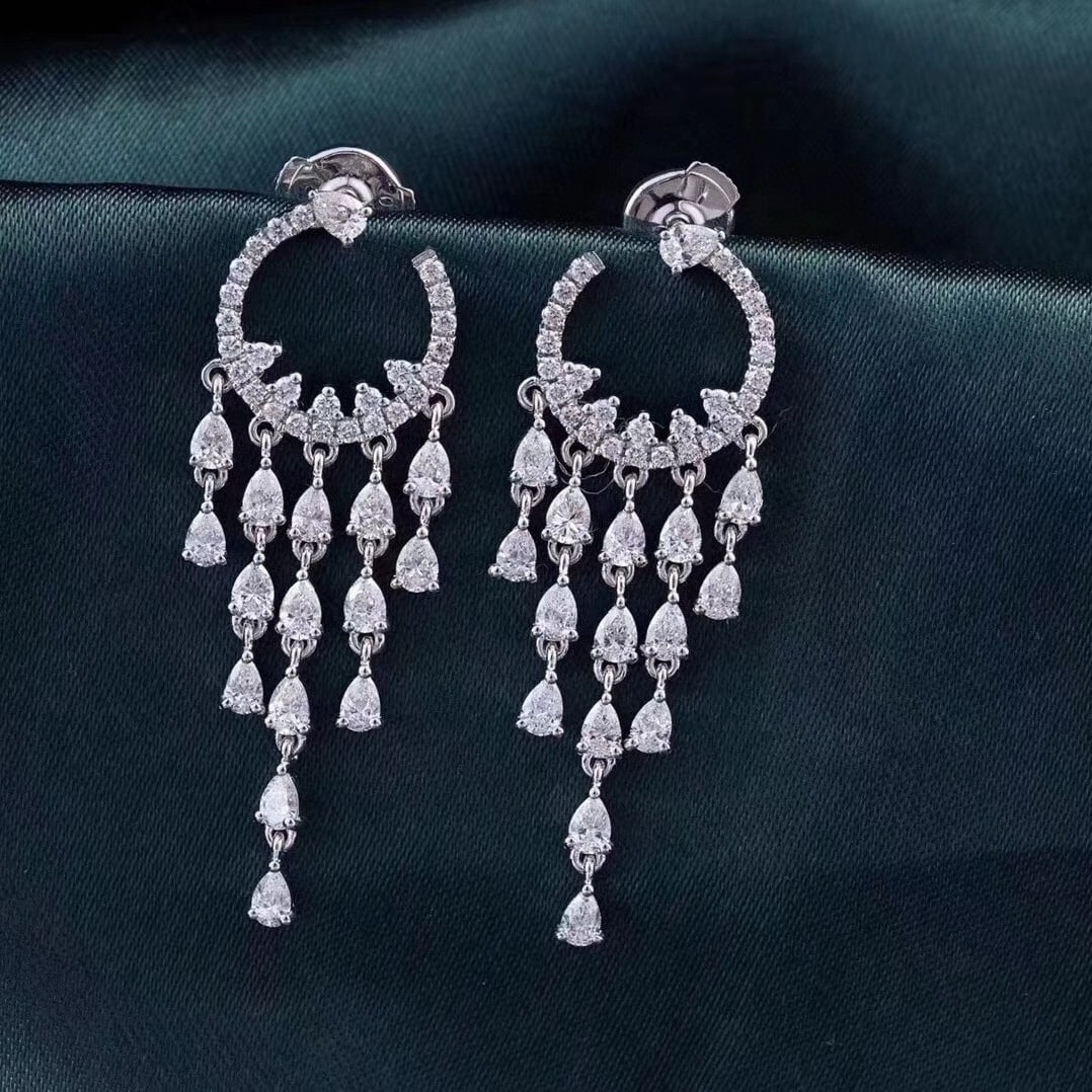 14k Gold 1.75 Ctw Natural H Diamond Earrings: Ref:230983054 // gold content:14k gold // main gemstone:diamond // shape:pear // carat weight:1. 36ct // clarity grade:vs-si // color:h // treatment:natural // // adjacent gemstone 2 : diamond // shap