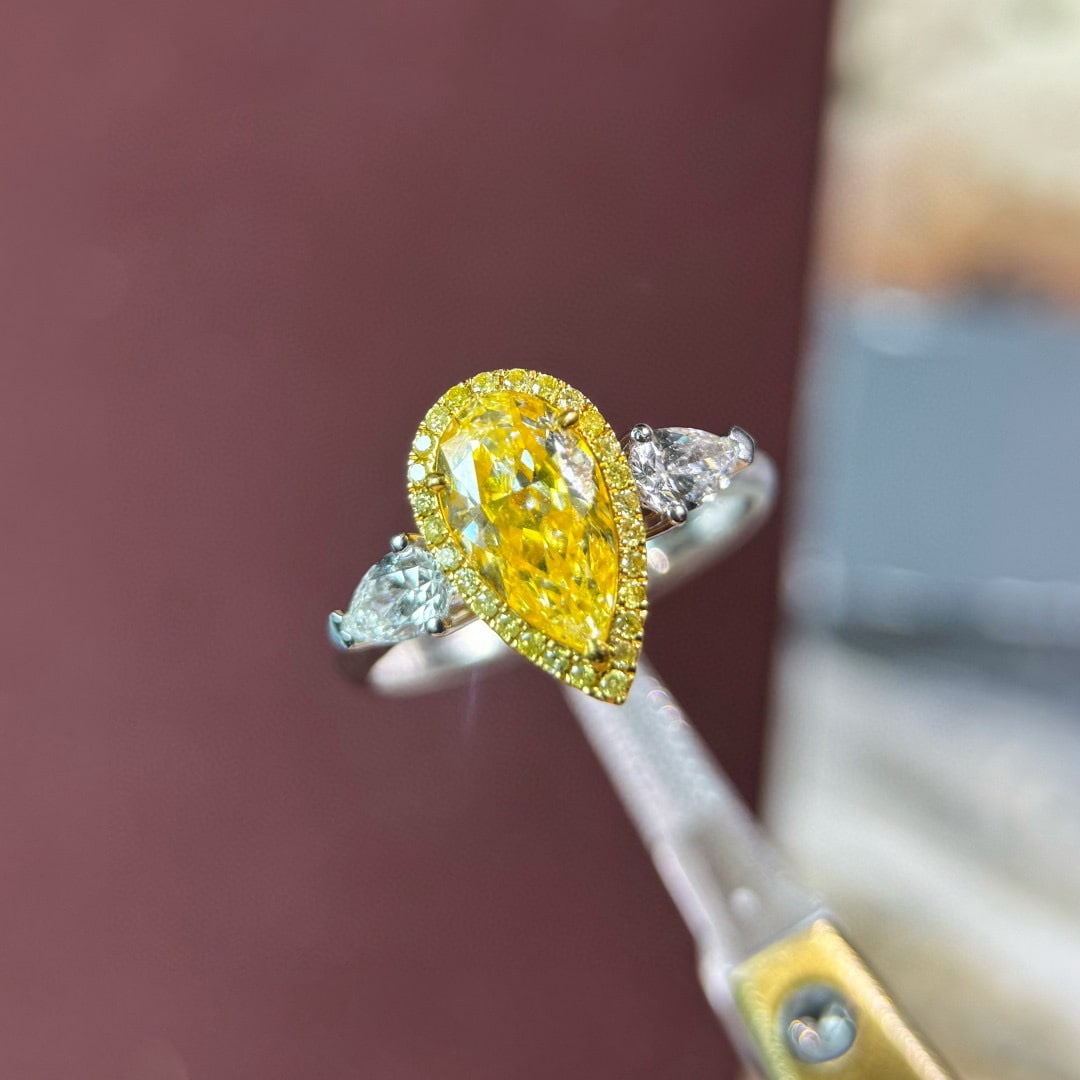 14k Gold 2.02 Ctw Natural Yellow Diamond & Diamond Ring: Ref:230983070 // gold content:14k gold // ring size:7. 25us // // main gemstone:yellow diamond // shape:pear // carat weight:1. 37ct // color:yellow // treatment:natural // // adjacent gemstone 2 :