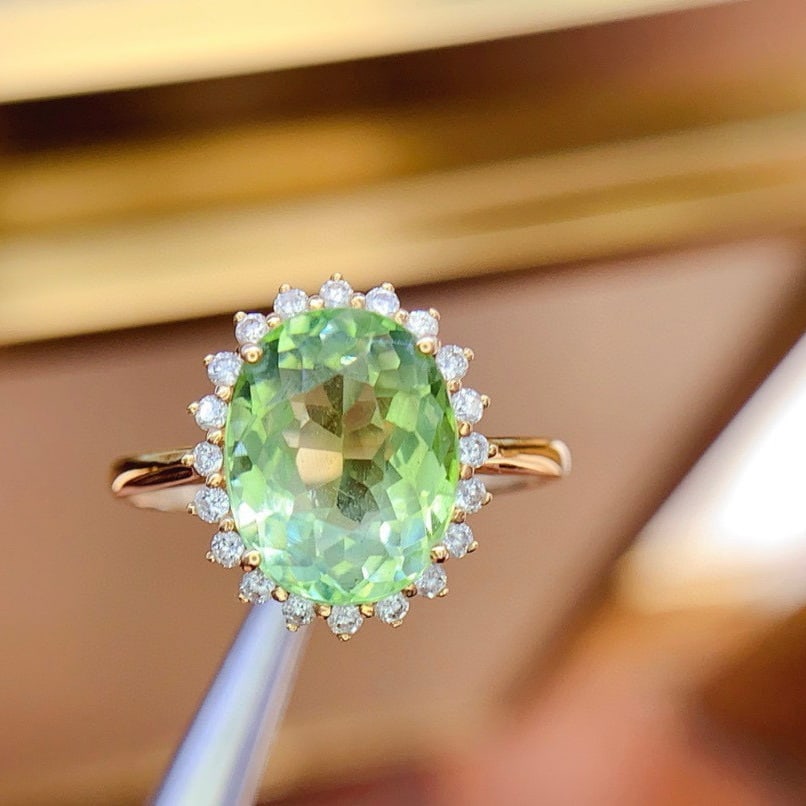 14k Gold 3.5 Ct Natural Tourmaline & Diamond Ring: Ref:230983076 // gold content:14k gold // ring size:7. 25us // // main gemstone:tourmaline // shape:oval // carat weight:3. 5ct // color:green // treatment:natural // // adjacent gemstone 2 : diamond