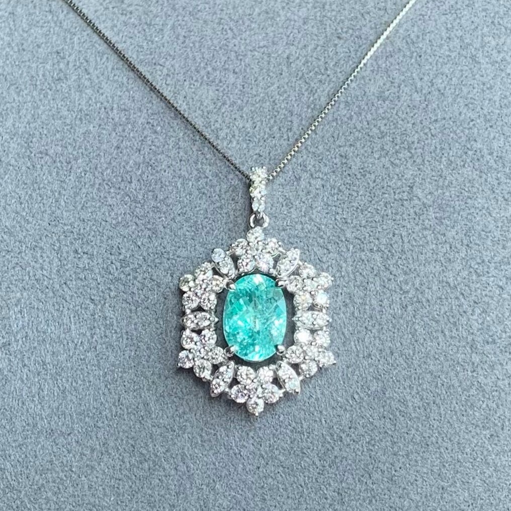 14k Gold 2.35 Ctw Natural Paraiba Tourmaline & Diamond Pendant( Without Chain ): Ref:230983111 // gold content:14k gold // main gemstone:paraiba tourmaline // shape:oval // carat weight:1. 43ct // color:blue // treatment:natural // // adjacent gemstone 2 : diamond // shape:round /