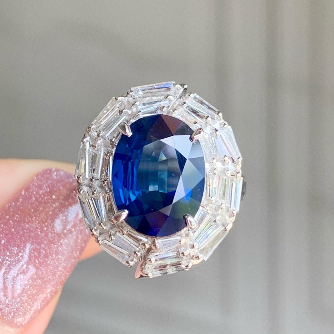 14k Gold 6.99 Ctw Natural Sapphire & Diamond Ring: Ref:230983142 // gold content:14k gold // ring size:7. 25us // // main gemstone:sapphire // shape:oval // carat weight:5. 25ct // color:blue // treatment:natural // // adjacent gemstone 2 : diamond //