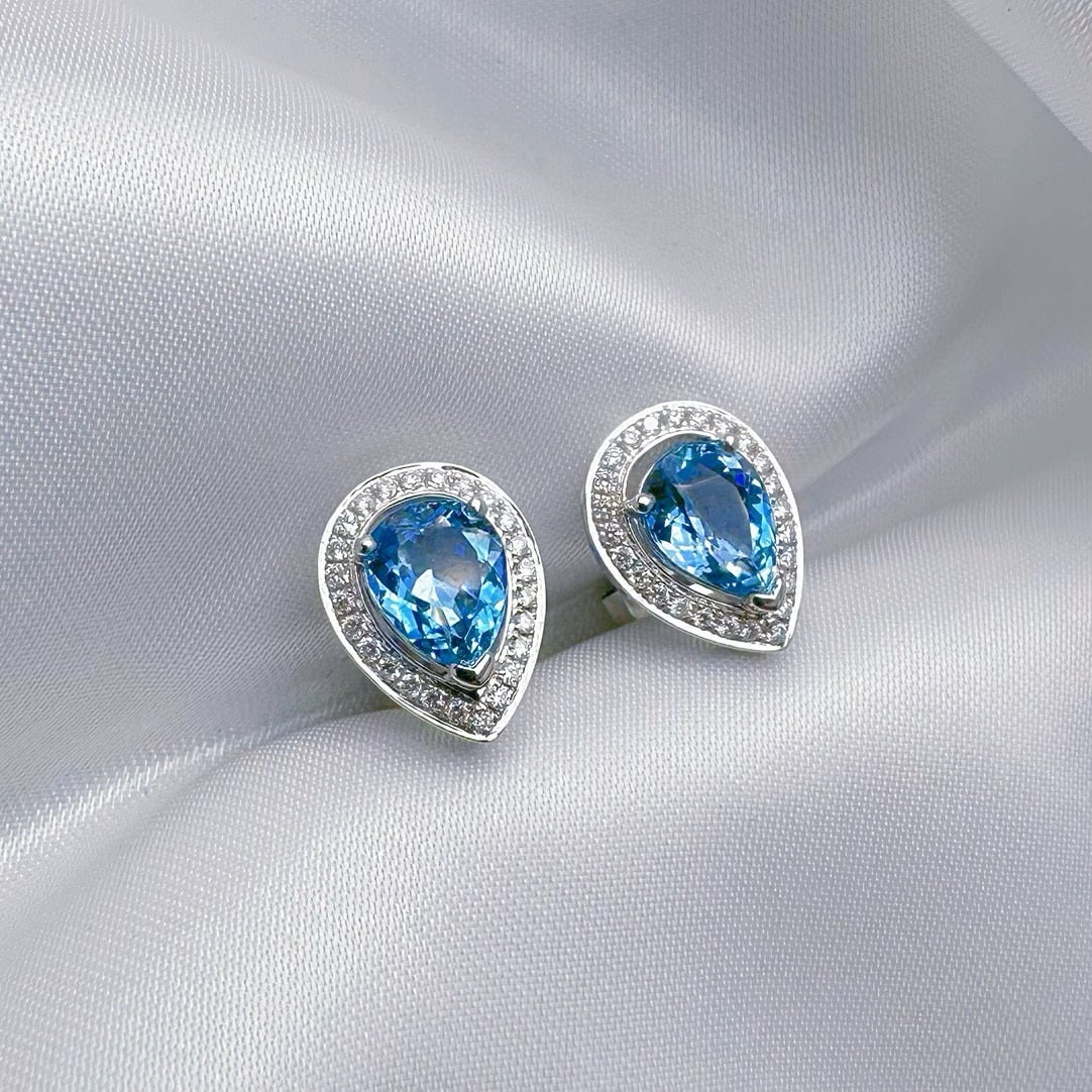 14k Gold 2.10 Ctw Natural Aquamarine & Diamond Earrings: Ref:230983143 // gold content:14k gold // main gemstone:aquamarine // shape:pear // carat weight:1. 85ct // color:santa maria color // treatment:natural // // adjacent gemstone 2 : diamond // shape:ro