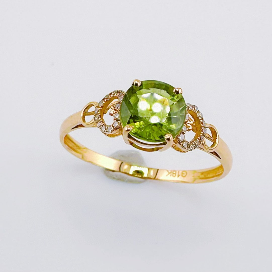 14k Gold 0.95 Ct Natural Tourmaline & Diamond Ring: Ref:230983144 // gold content:14k gold // ring size:7. 25us // // main gemstone:tourmaline // shape:oval // carat weight:0. 95ct // color:green // treatment:natural // // adjacent gemstone 2 : diamond
