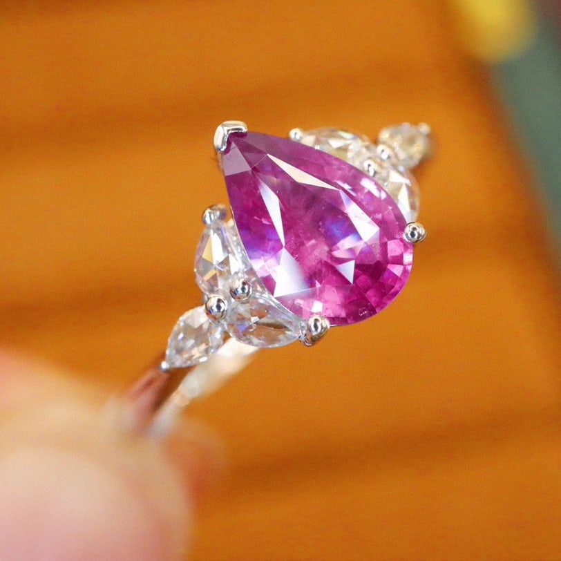 14k Gold 1.22 Ctw Natural Sapphire & Diamond Ring: Ref:230983148 // gold content:14k gold // ring size:7. 25us // // main gemstone:sapphire // shape:pear // carat weight:1. 06ct // color:pinkish purple // treatment:natural // // adjacent gemstone 2 :