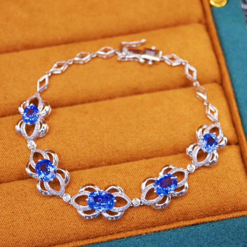 14k Gold 7.26 Ctw Natural Sapphire & Diamond Bracelet: Ref:230983211 // gold content:14k gold // main gemstone:sapphire // shape:oval // carat weight:6. 85ct // color:cornflower blue // treatment:natural // // adjacent gemstone 2 : diamond // number of st