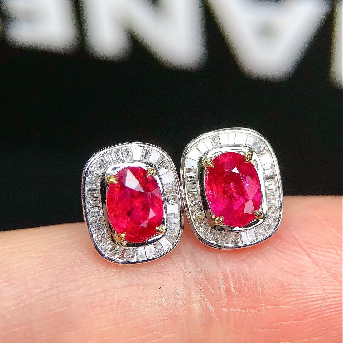 14k Gold 2.15 Ctw Natural Ruby & Diamond Earrings: Ref:230983216 // gold content:14k gold // main gemstone:ruby // shape:oval // carat weight:1. 6ct // color:red // treatment:natural // // adjacent gemstone 2 : diamond // shape:baguette // carat